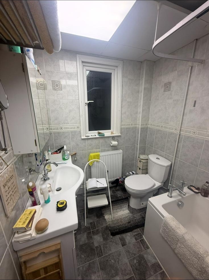 Dated bathroom before a full renovation by EPS LTD